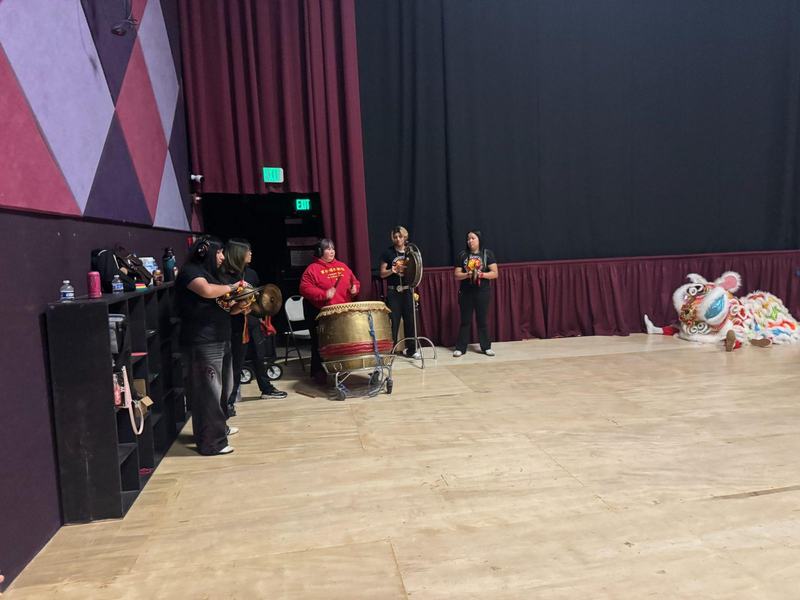 Musicians play traditional drums and cymbals